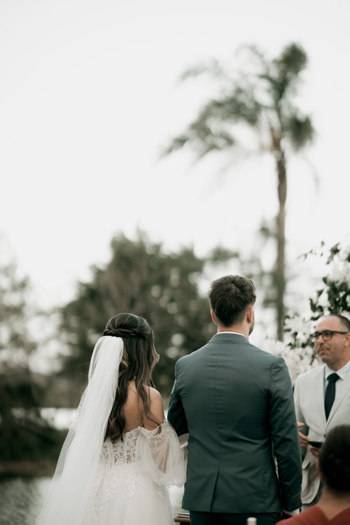 outdoor wedding ceremony with bride and groom Licensed inspiration image; not a BMG client portfolio claim.